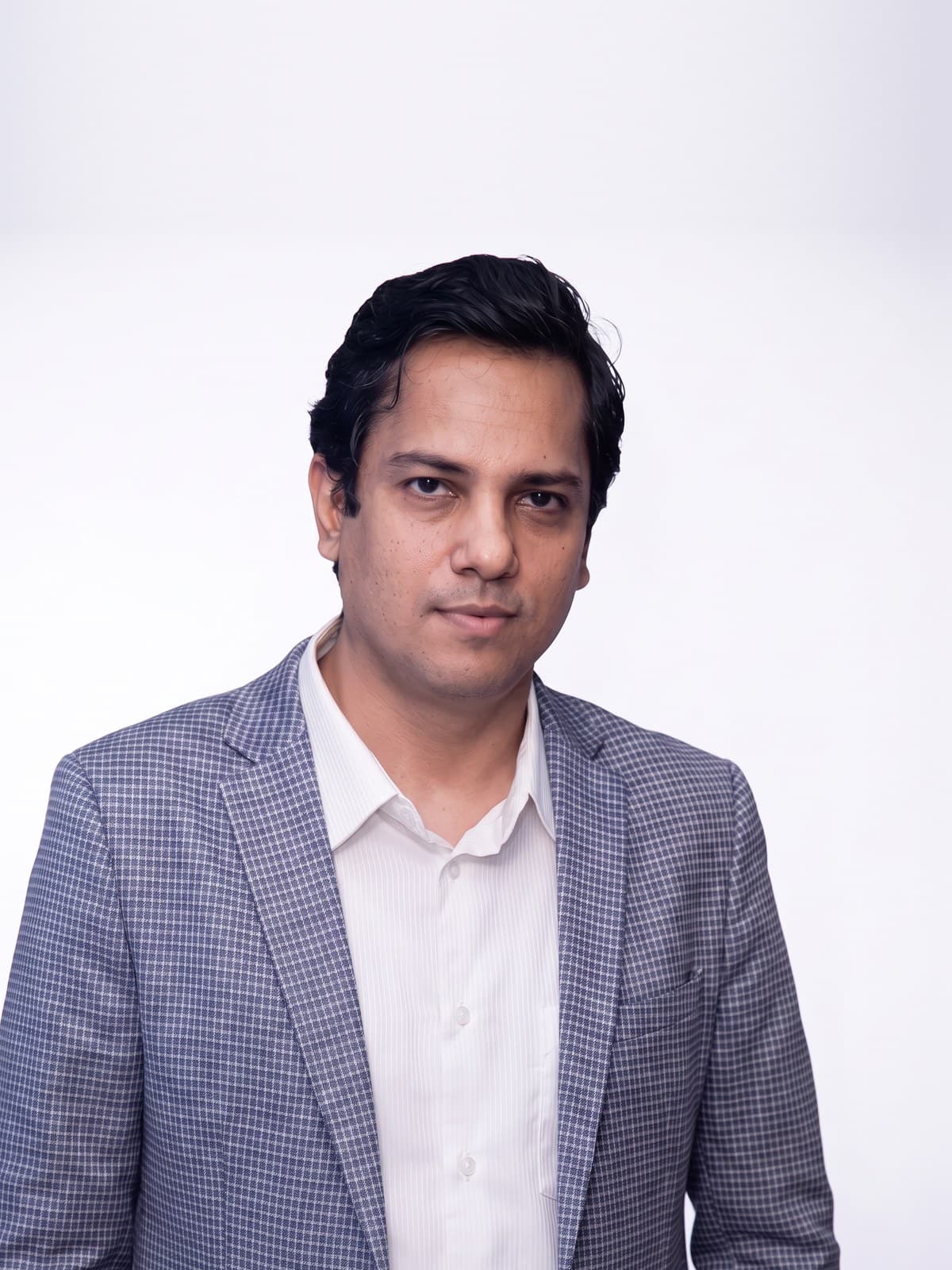 Portrait of M R Q Motin, Founder and CEO of Optyv